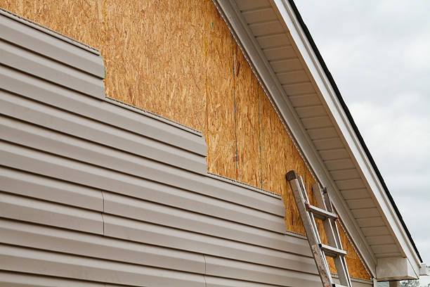 Professional Storm Damage Siding Repair technician working in Morrisdale, PA